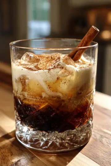 Perfect spiced rum white russian recipe with layered cream. Easy 5-minute cocktail with warm spices. Step-by-step guide from Lola's Kitchen.